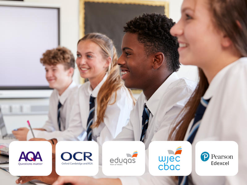 Engaged students in a classroom with major UK exam board logos: AQA, OCR, Eduqas, WJEC CBAC, and Pearson Edexcel